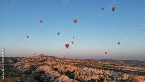 Incredible sunrise and balloons over the hills in Cappadocia. The view from the drone. © Georgii