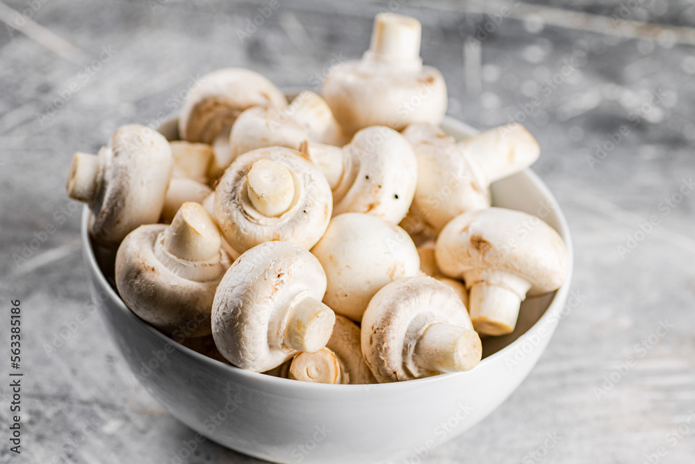 Full bowl with mushrooms on the table. Full bowl with mushrooms on the table.