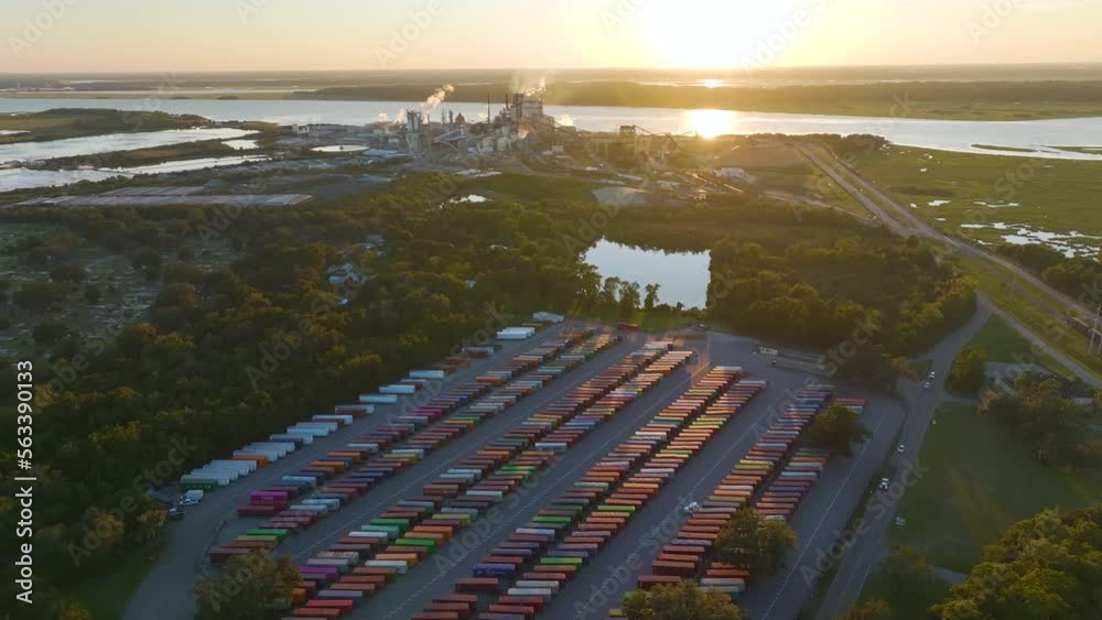 Aerial view of large cargo container yard with rows of freight ...