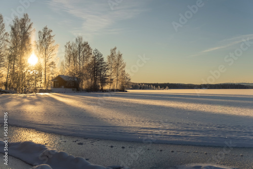 Walk at Väsman's ice-covered beaches in Ludvika Dalarna Sweden in January © Olavi