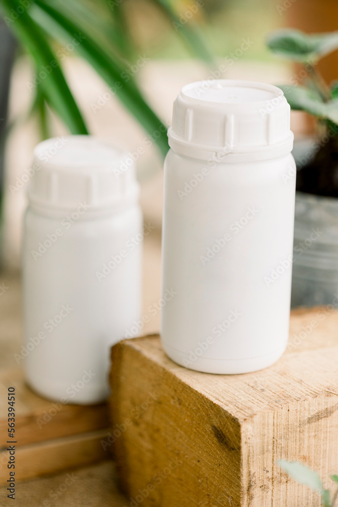 Liquid and solid vermicompost in plastic bottles and straws. Liquid and solid vermicompost in plastic bottles and straws.