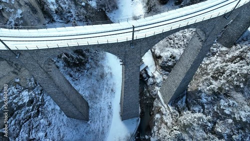 Landwasser Viaduct world heritage in Swiss Alps snow winter scenery, Switzerland.