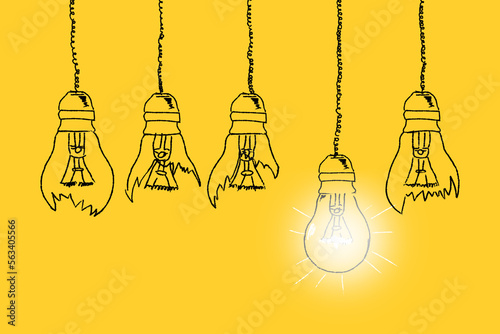 Set of light bulbs hand drawn on a yellow background. Concept of unique thinking. Idea concept. Good and bad ideas.