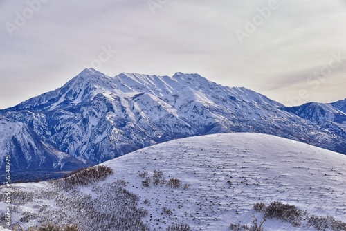 Timpanogos Peak snow covered mountain views from Maack Hill hiking Lone Peak Wilderness Wasatch Rocky Mountains, Utah. United States.   photo