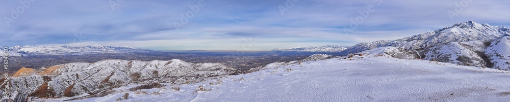 Maack Hill Sensei trail snowy mountain valley views in Lone Peak Wilderness Wasatch Rocky Mountains, Utah. USA. 