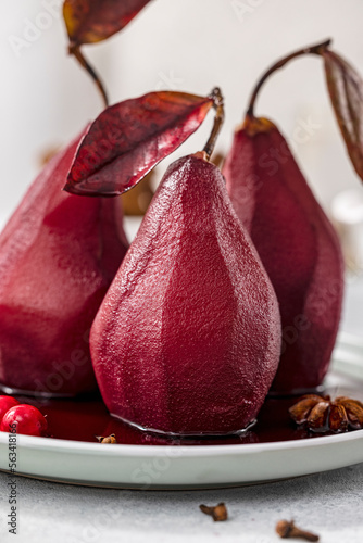 Traditional french dessert pears stewed in red wine