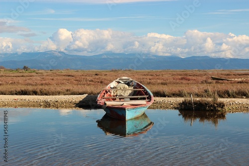 Traditional Greek wooden fishing boat of "Prairie" moored in the Ambracian Gulf in Epirus, Greece