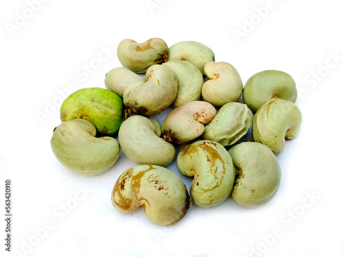 Cashew raw nuts on white background. Selective focus.
