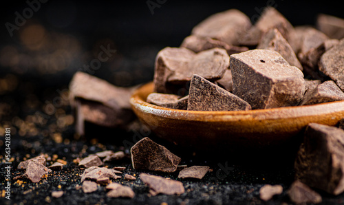 Pieces of milk chocolate on a plate. 