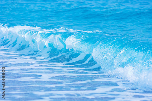 Nature background, closeup blue sea wave on beach Turkey