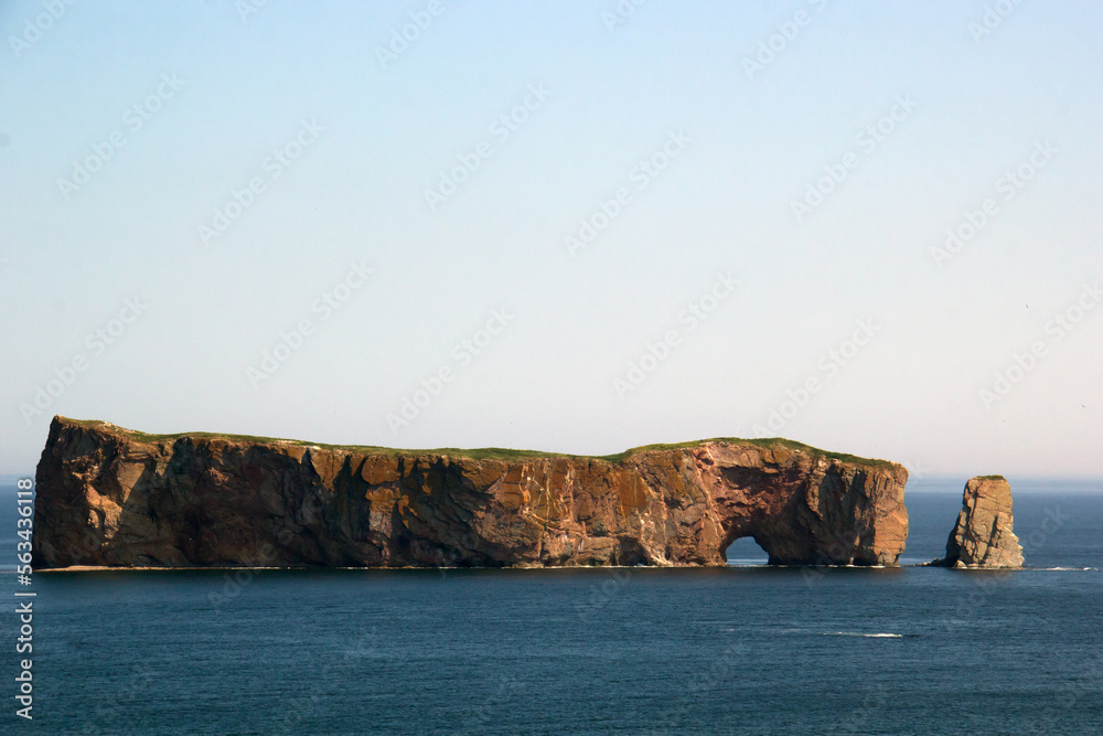 Roché Percé, a natural hole in a huge rock in the ocean