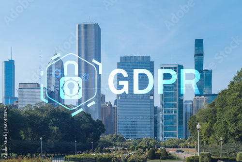 Chicago skyline from Butler Field towards financial district skyscrapers, day time, Illinois, USA. Parks and gardens. GDPR hologram, concept of data protection regulation and privacy for individuals