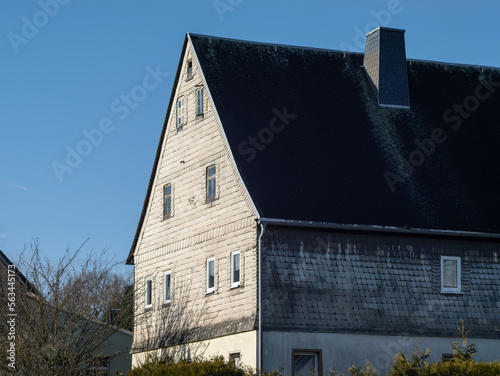 Asbest sheets as a cladding on an old building in a rural area in Eastern Germany. Dangerous material that causes asbestosis when the toxic fibers are getting in the human body.