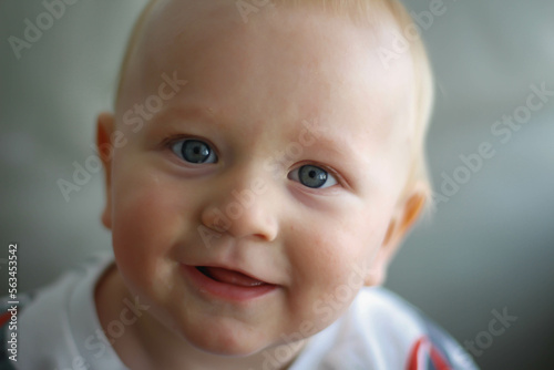 portrait of a smiling baby with bright eyes