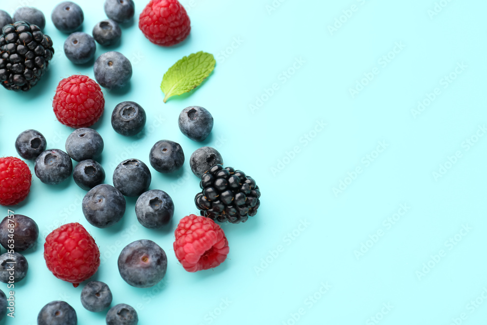 Different fresh ripe berries on color background Different fresh ripe berries on color background