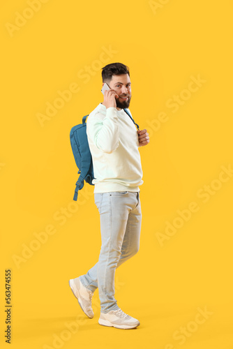 Young bearded man with back...