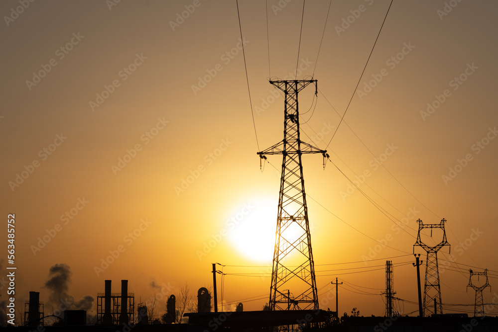 Fototapeta premium high-voltage power lines at sunset,high voltage electric transmission tower