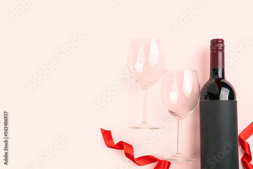 Romantic red wine bottle an...