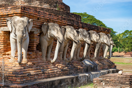 Photography Restored old elephant sculptures ont the ruins of the ancient Buddhist temple of Wat Sorasak
