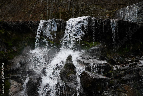 waterfalls. beautiful waterfall in a forested mountain area. nature in all its beauty.