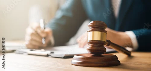 Obraz Justice concept, male judge doing report papers in courtroom, fair trial, drafting new law to modern era.