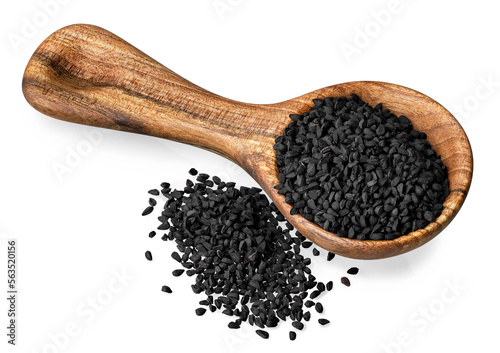 black cumin seeds in round scoop and heap near isolated on white
