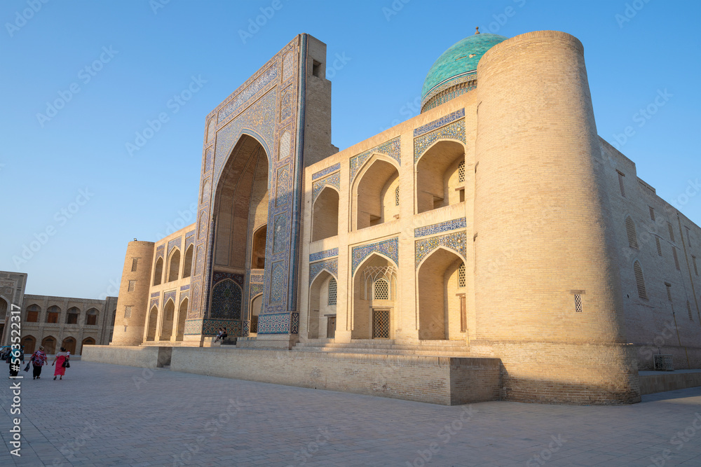 At the medieval madrasah Miri-Arab on a sunny evening. Bukhara