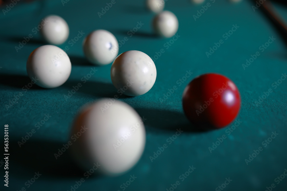 Russian billiard balls, cue, triangle, chalk on a table Green cloth Copy space Russian billiard balls, cue, triangle, chalk on a table Green cloth Copy space
