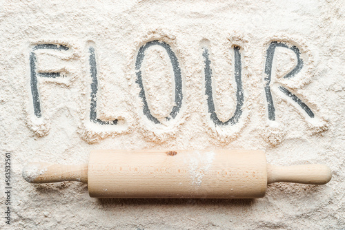 Flour and rolling pin, top view