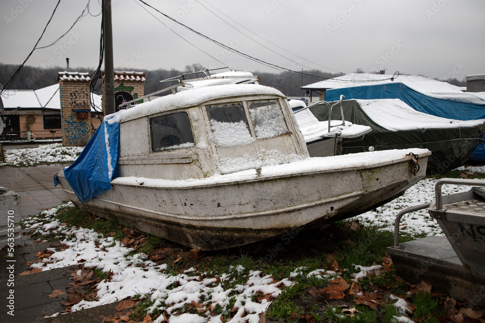 A weathered boat in a dry dock on the banks of the Danube in Zemun, Serbia