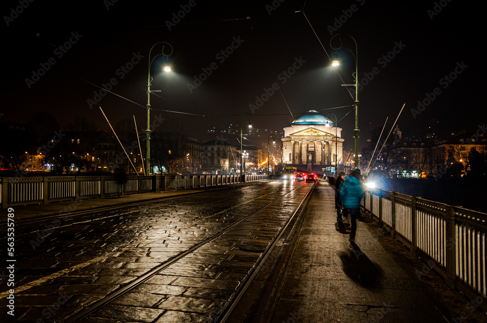 Turin by night, Vittorio Emanuele I bridge on Po river in front Gran Madre di Dio's Church