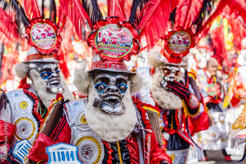 man in red mask at  The festival of the Santísima Trinidad del Señor Jesús del Gran Poder in the city of La Paz