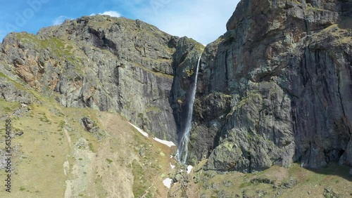 Aerial drone 4K view of Raisko Praskalo waterfall in Central Balkan National Park near Botev Peak and town of Kalofer, Balkan Mountain, one of the tallest waterfalls in Bulgaria photo