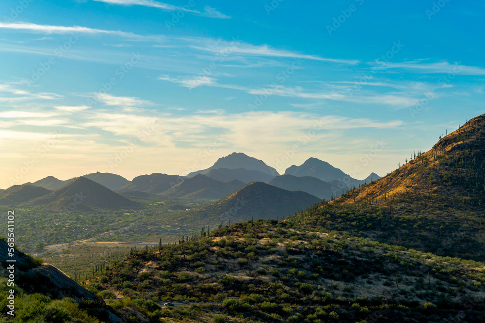 Fototapeta premium Rolling moutains and mounds in the hillsides of Arizona in Tuscon southwest american united states in late sunset