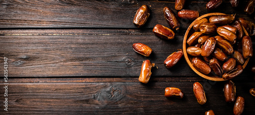 Ripe dates on a plate. 