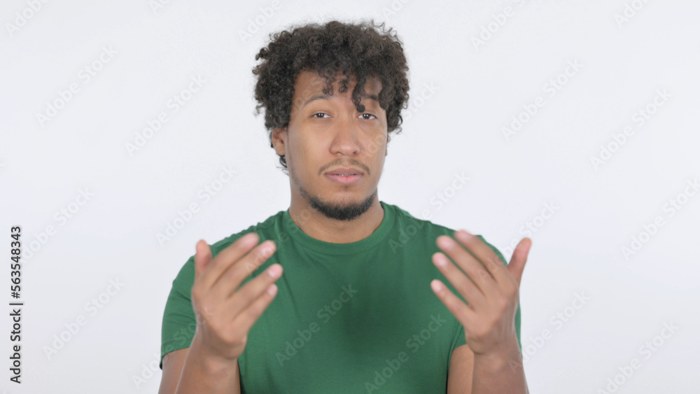 African Man Pointing at Camera, Inviting on White Background African Man Pointing at Camera, Inviting on White Background