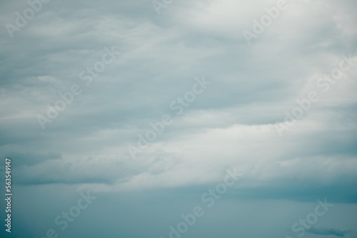 Overcast sky on rainy day with Nimbostratus clouds. Gloomy and moody background. Overcast clouds. Bad weather. Sad and depressed background. © panophotograph