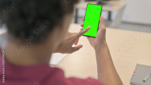 African Man Using Smartphone with Green Screen