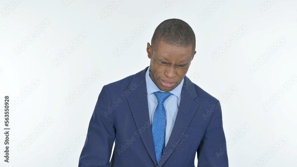 Sad African Businessman Crying on White Background Sad African Businessman Crying on White Background
