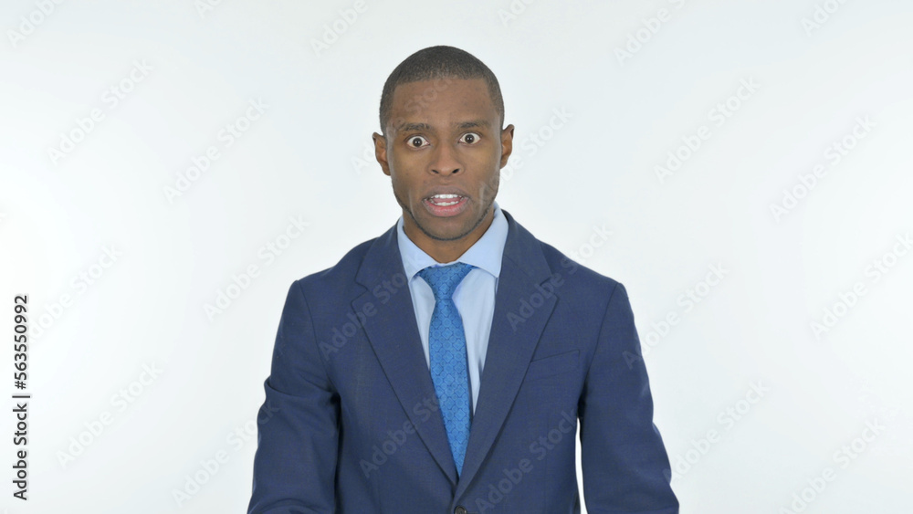 Angry African Businessman Arguing on White Background Angry African Businessman Arguing on White Background