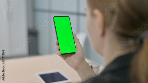 Businesswoman Using Smartphone with Green Screen