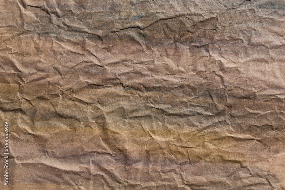 Background in warm and cool tones. Creased, wrinkled paper texture. Design, retro, vintage, grunge. Background in warm and cool tones. Creased, wrinkled paper texture. Design, retro, vintage, grunge.