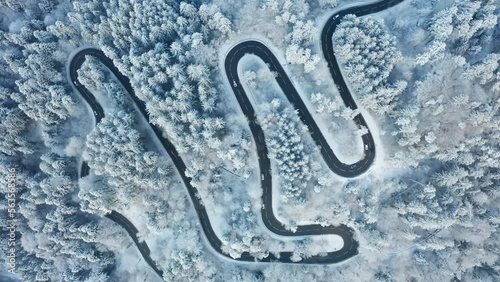windy road in winter with snow aerial