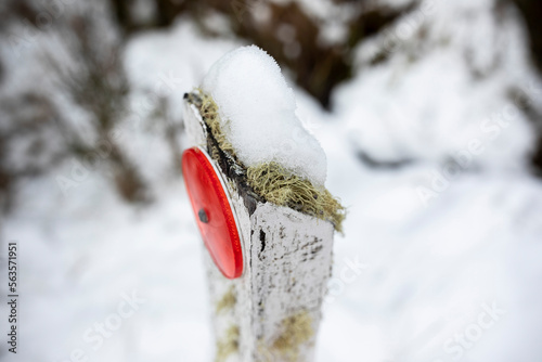 Fototapeta Snow on road post