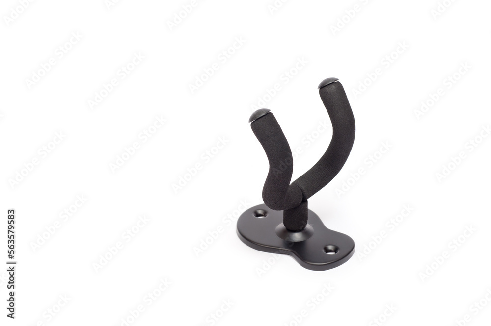 Wall mount for an acoustic or electric guitar, shot against a white background. Wall mount for an acoustic or electric guitar, shot against a white background.