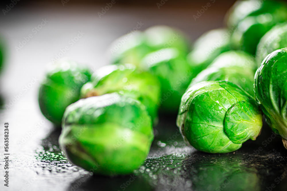 A pile of Brussels cabbage on the table. A pile of Brussels cabbage on the table.