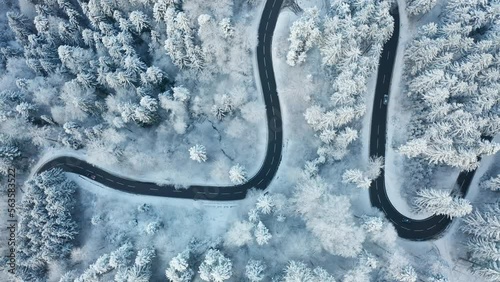windy road in winter with snow aerial