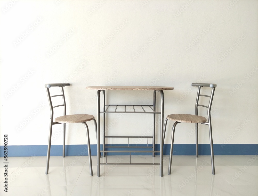wood table and chair on white wall wood table and chair on white wall