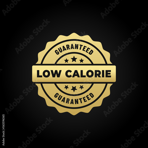 Low Calorie Label Vector or Elegant Low Calorie Stamp Vector On Black Background. low calorie product label suitable for packaging design. Best low calorie icon with elegant design.