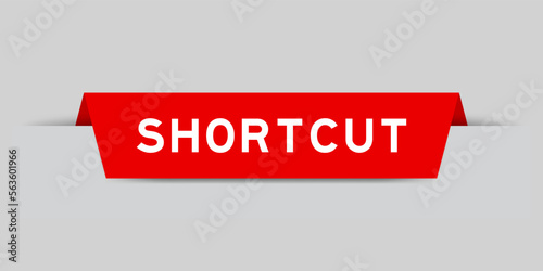 Red color inserted label with word shortcut on gray background photo